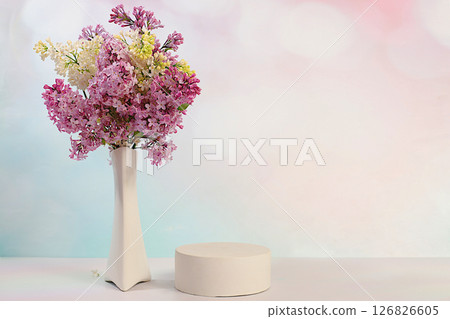 Abstract floral arrangement with purple lilac flowers, banner.Empty podium with spring lilac flowers. Creative template for your design.Minimal modern aesthetics, elegant beauty concept 126826605