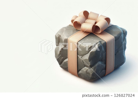 A heavy gift, a stone under a bow. Space for text. 126827024