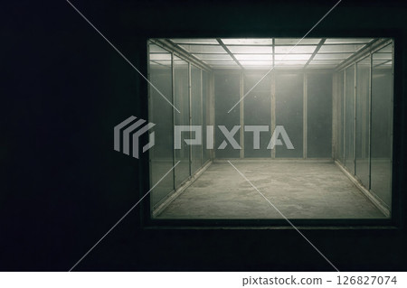A glass room behind a frosted window in the dark. Space for text. 126827074