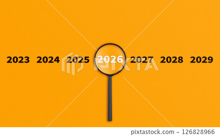 Lens, magnifying glass focusing on the year 2026 on a Orange background. Financial or stock market strategies and past and future events. 126828966