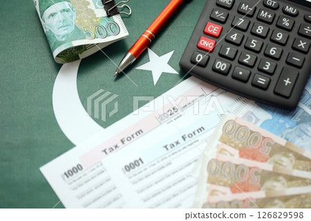 Pakistan rupees banknotes and medicine pills. Pakistan real money and tax blank close up 126829598
