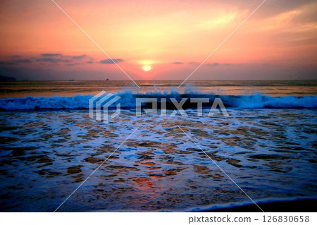 Sunrise on the sandy beach Sunrise on the sandy beach 126830658