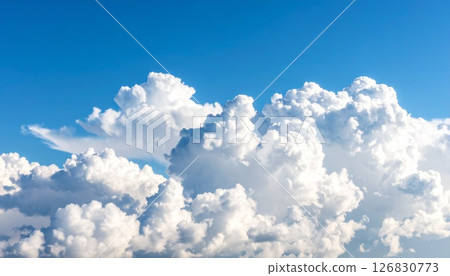 A summer sky of blue skies and pure white cumulonimbus clouds 126830773