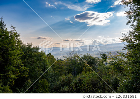 Overlook of New Hampshire's Franconia Notch State Park with open valley and stunning view. Overlook of New Hampshire's Franconia Notch State Park with open valley and stunning view. 126831681