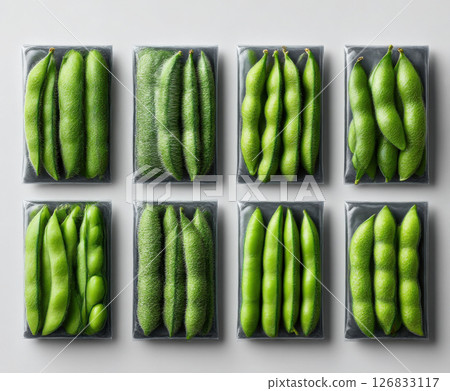 Fresh green edamame beans in various packaging arrangements on light background 126833117
