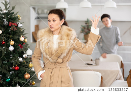 Mother leaving son home alone Mother leaving son home alone 126833227