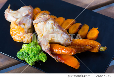 Teriyaki partridge with grilled carrots 126833259