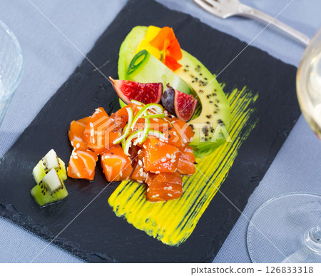 Tartar with tuna, avocado, mango sauce Tartar with tuna, avocado, mango sauce 126833318