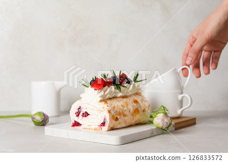 Meringue roll, concept of tasty and delicious food Meringue roll, concept of tasty and delicious food 126833572