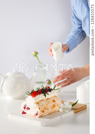 Meringue roll, concept of tasty and delicious food Meringue roll, concept of tasty and delicious food 126833573