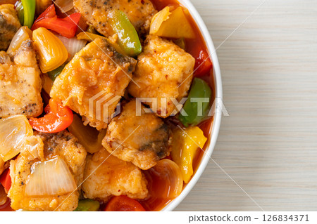 fish stew with tomato and pepper 126834371