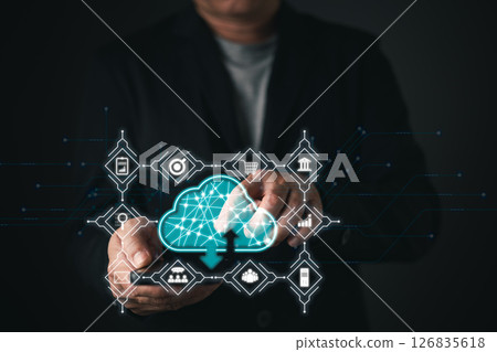A man touches a cloud computing diagram, symbolizing cloud technology for data storage, secure backup, and networking, highlighting its role in business and internet services. 126835618