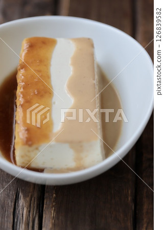 Yudofu (soft silken tofu smothered in two different sauces) 126839582