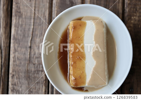 Yudofu (soft silken tofu smothered in two different sauces) 126839583