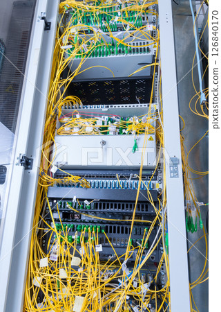 server with connected fiber optic cables 126840170