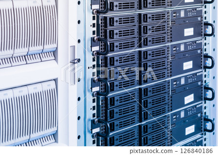Cluster of data storage hard drives inside server room 126840186