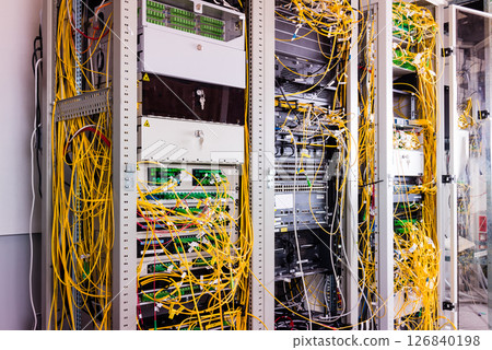 servers with connected fiber optic cables 126840198