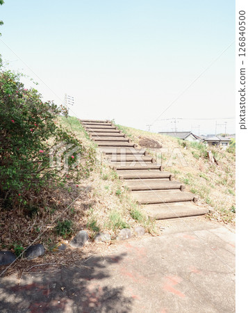 A stairway leading to the sea 126840500