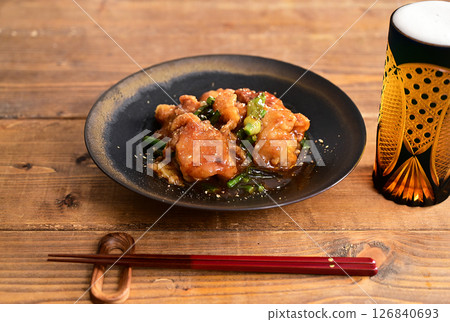 Deep-fried chicken thighs with sweet and sour sauce 126840693