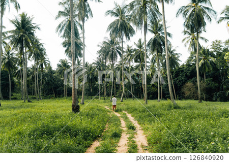 Man Exploring the Path to the Heart of an Island Paradise 126840920