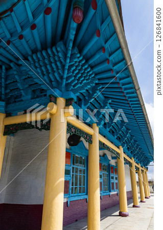 carved wooden roof of Dungan mosque in Karakol, Kyrgyzstan. Travel landmark 126841600