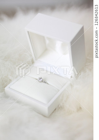 Engagement ring in a white box 126842613