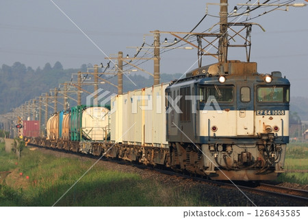A long freight train running on the Narita Line 126843585