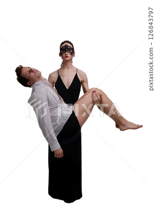 Couple sharing a playful, intimate moment in a studio setting 126843797