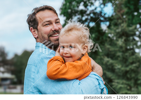 Portrait of dad and child enjoying time together Portrait of dad and child enjoying time together 126843990