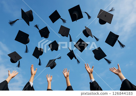 Students tossing the hat at the graduation ceremony 126844183