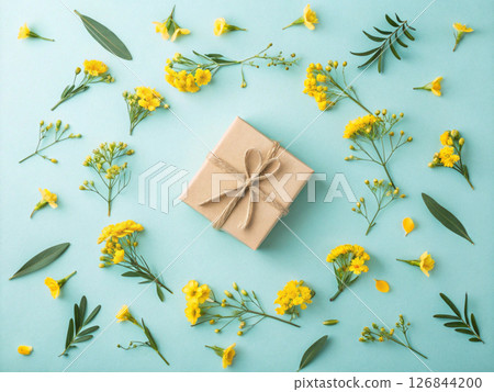 Bouquet of sunflowers on a bright blue background. Father's Day image. Expressing gratitude. Bouquet of sunflowers on a bright blue background. Father's Day image. Expressing gratitude. 126844200