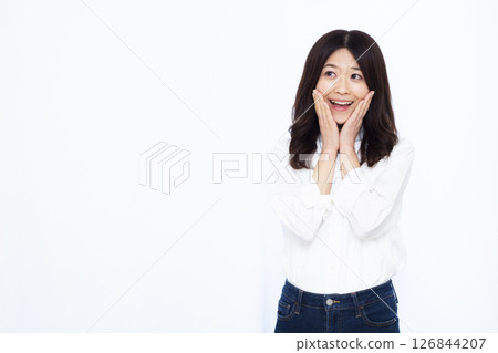 A woman smiling and surprised 126844207