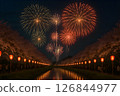 A summer festival where fireworks are lit up with lanterns 126844977