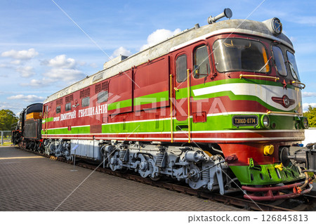 Red orange vintage retro train trains steam locomotive locomotives Belarus. 126845813
