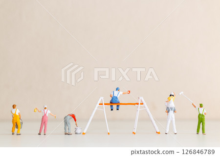 Miniature Painters at Work on Blank Wall Miniature Painters at Work on Blank Wall 126846789