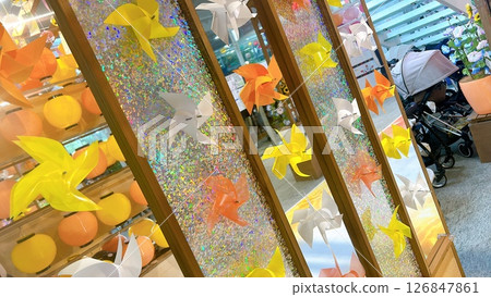 Summer scenery with windmills and wind chimes 126847861