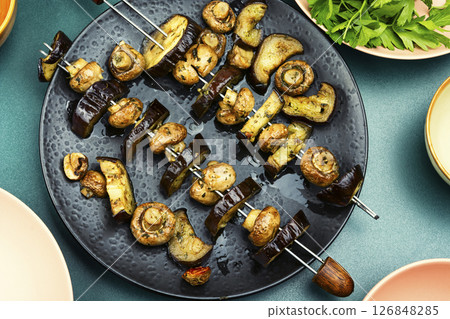 Plate of grilled vegetable skewers, kebabs. 126848285