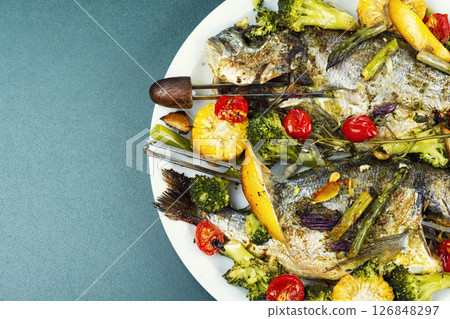Grilled fish with vegetables. Grilled fish with vegetables. 126848297