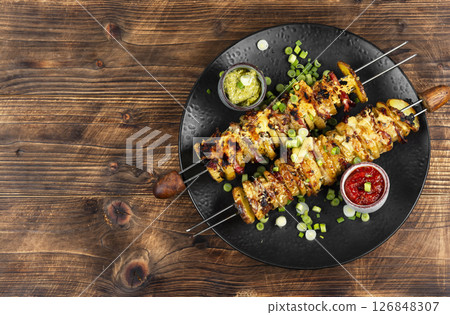 Delicious skewers with potatoes. 126848307