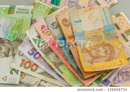 Currency collection showing various denominations of banknotes 126848734