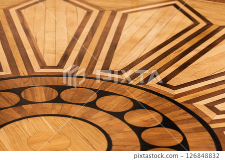 Vintage parquet close up view. A detailed geometric pattern Vintage parquet close up view. A detailed geometric pattern 126848832