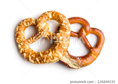 Salted bavarian pretzel isolated on white background. Salted bavarian pretzel isolated on white background. 126849235
