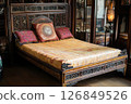 Antique Carved Wooden Bed with Exquisite Details 126849526