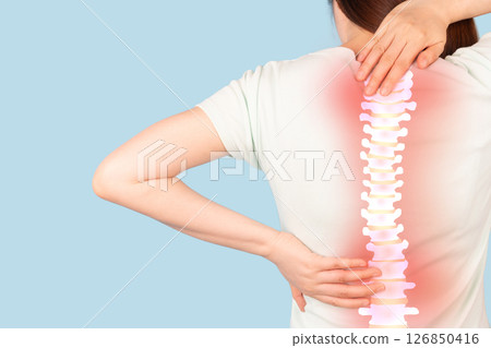 Woman suffering from back pain with anatomy of spine and xray for diagnosis over blue background. Common causes include injuries like inflammation of muscle ache or spinal stenosis. Woman suffering from back pain with anatomy of spine and xray for diagnosis over blue background. Common causes include injuries like inflammation of muscle ache or spinal stenosis. 126850416
