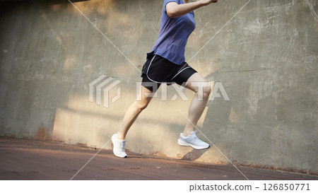 Outdoor Running Routine on a Sunny Day. Running Motivation. Start Your Fitness Journey. Outdoor Running Routine on a Sunny Day. Running Motivation. Start Your Fitness Journey. 126850771