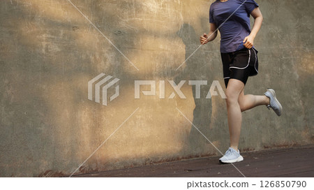 Outdoor Running Routine on a Sunny Day. Running Motivation. Start Your Fitness Journey. 126850790