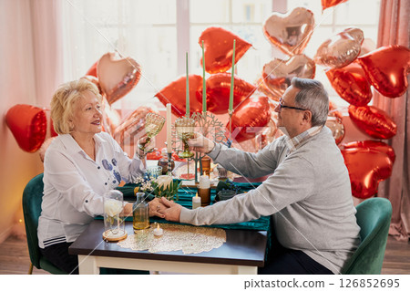Romantic elderly couple celebrating 126852695