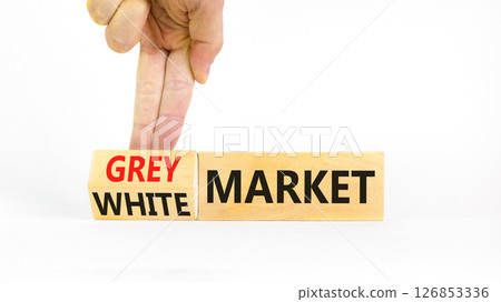 Grey or white market symbol. Concept words Grey market or White market on beautiful wooden blocks. Beautiful white background. Businessman hand. Business grey or white market concept. Copy space. 126853336