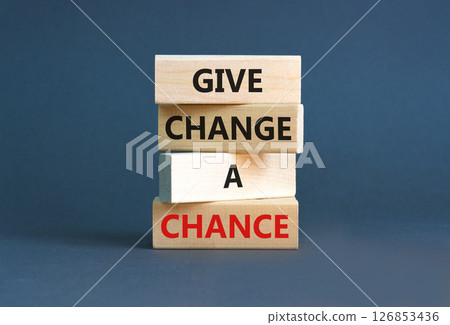 Give change a chance symbol. Concept words phrase Give change a chance on beautiful wooden blocks. Beautiful grey paper background. Business Give change a chance concept. Copy space. 126853436