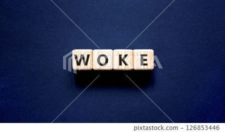 Woke question symbol. Concept word Woke question on beautiful wooden blocks. Beautiful black table black background. Business, lifestyle, support and woke question concept. Copy space. 126853446
